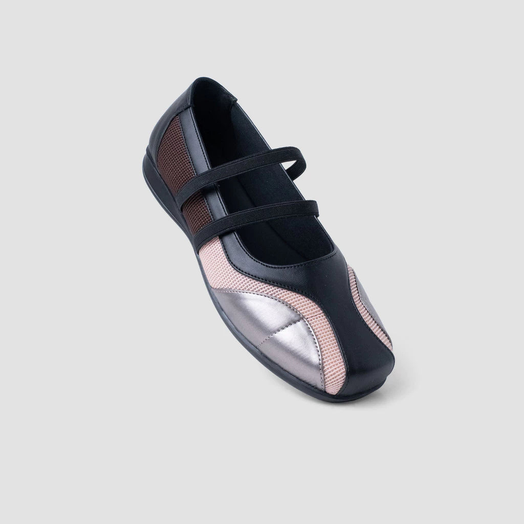 A black and pink Mary Jane style flat shoes by MKS Shoes with a flat sole and loop straps