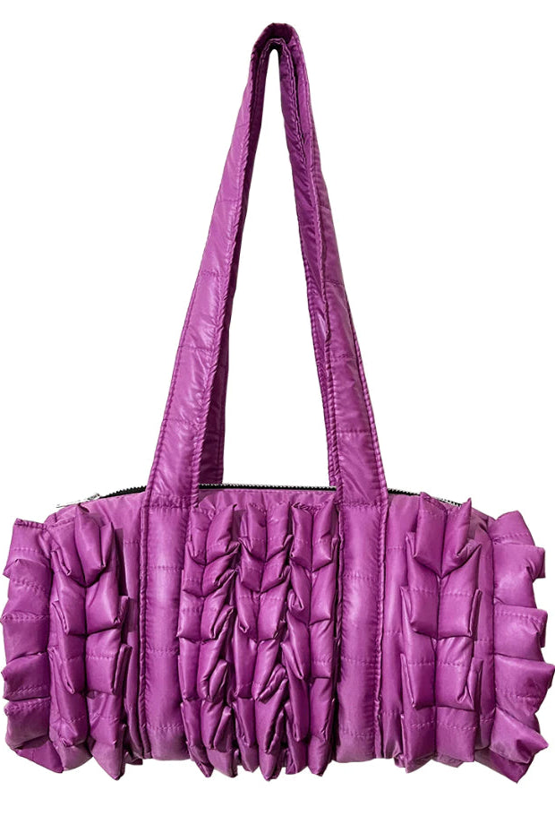 Purple ruffled duffle bag by Mannequin Plastic on a white background