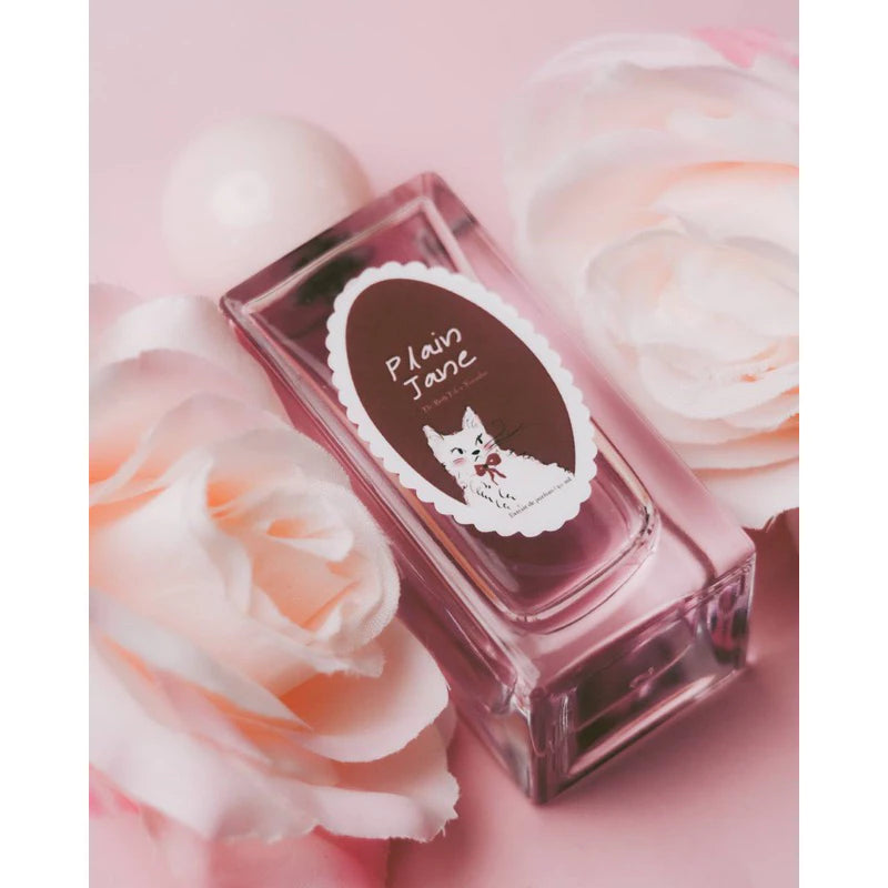Plain Jane Extrait De Parfum by The Body Tale – feminine fragrance in a pink bottle with floral notes.