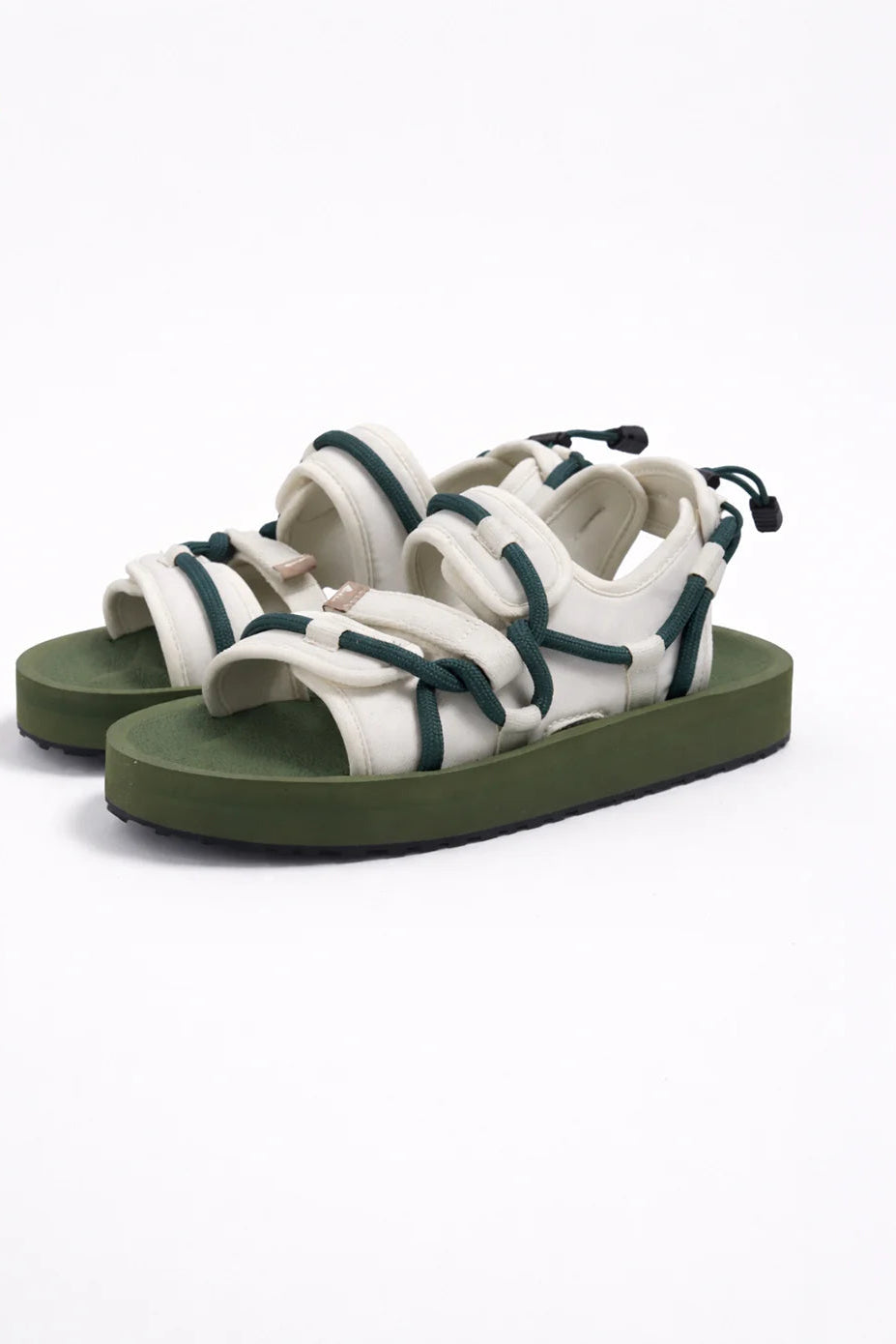 Pair of green sandals by Gahalu with white and green straps on a white background