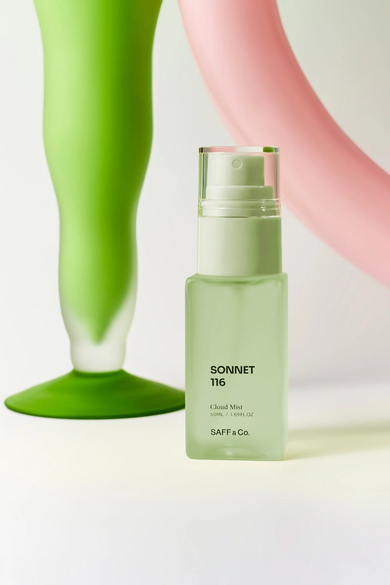 Green body mist bottle labeled 'SONNENT 116' by Saff & Co on a light background