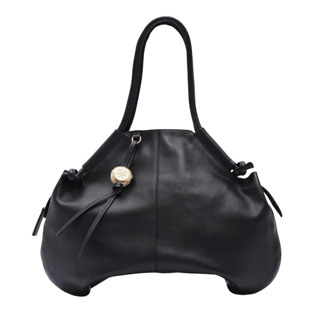 Black leather handbag with a gold clasp on a white background

Tas tangan wanita berbahan kulit berwarna hitam dengan pengait emas