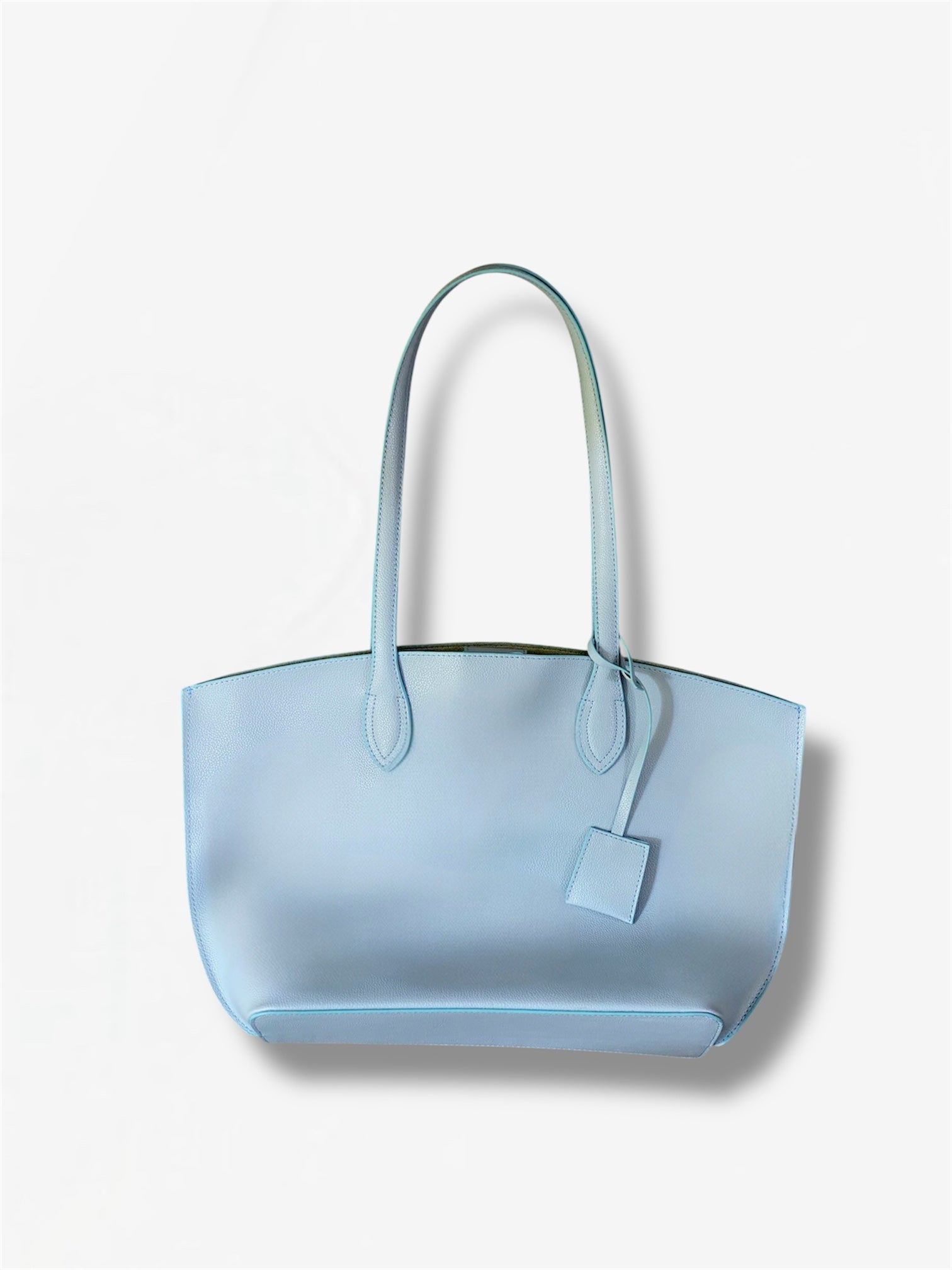Light blue tote bag from Masagi on a white background