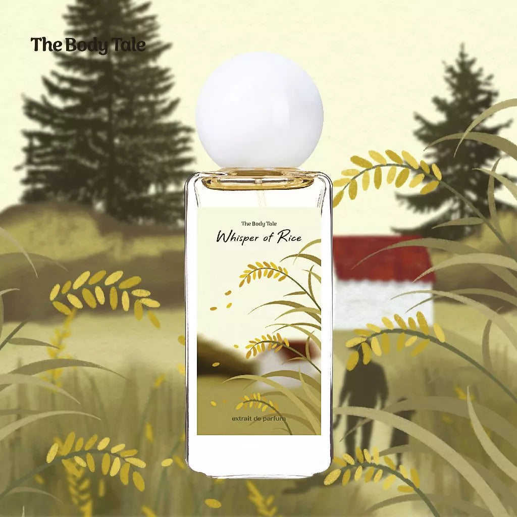 Perfume bottle labeled 'Whisper of Rice' and 'Extrait De Parfume' by The Body Tale with a nature-themed background