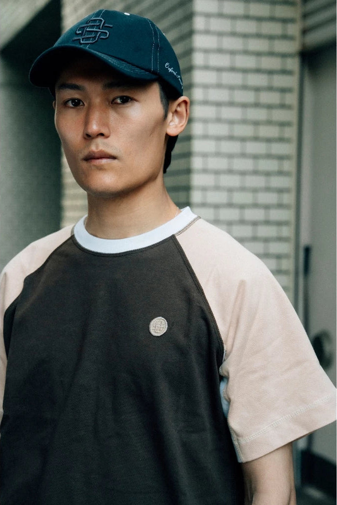 Oxford Society Mura raglan T Shirt In Brown - Oxford Society